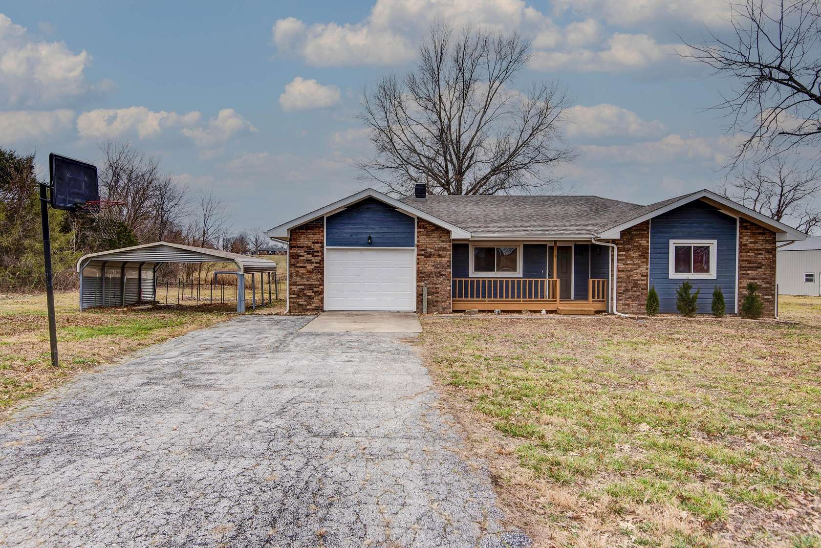 3.8 Acres of Residential Land with Home for Sale in Ozark, Missouri