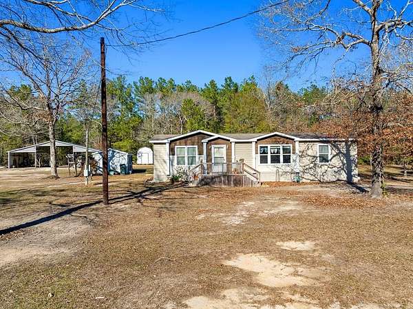 1.53 Acres of Land with Home for Sale in Brookeland, Texas