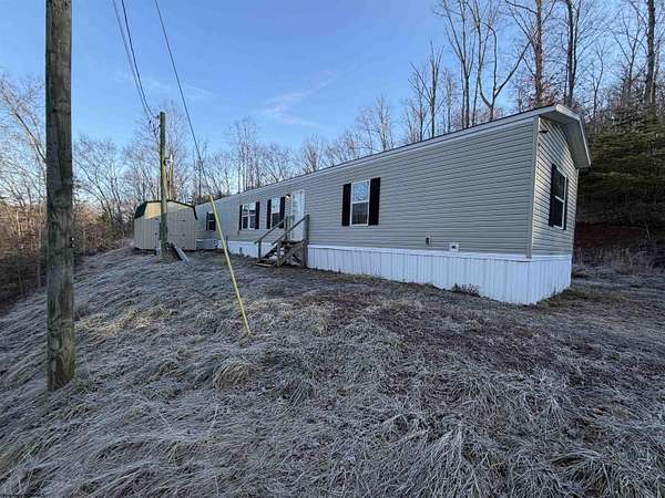 6.9 Acres of Land with Home for Sale in Cairo, West Virginia