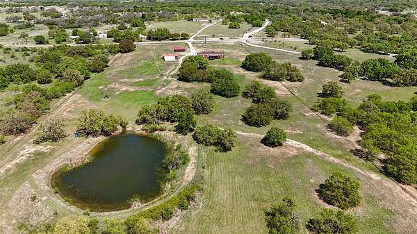 10 Acres of Recreational Land with Home for Sale in May, Texas