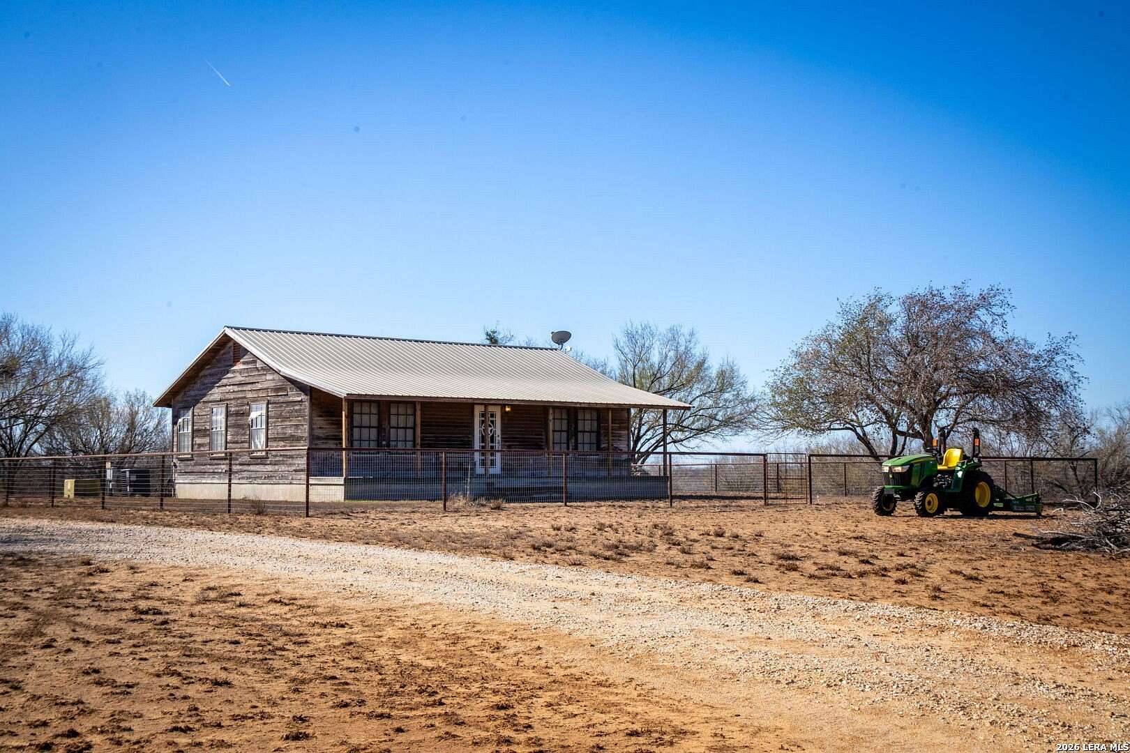 5.5 Acres of Residential Land with Home for Sale in Jourdanton, Texas