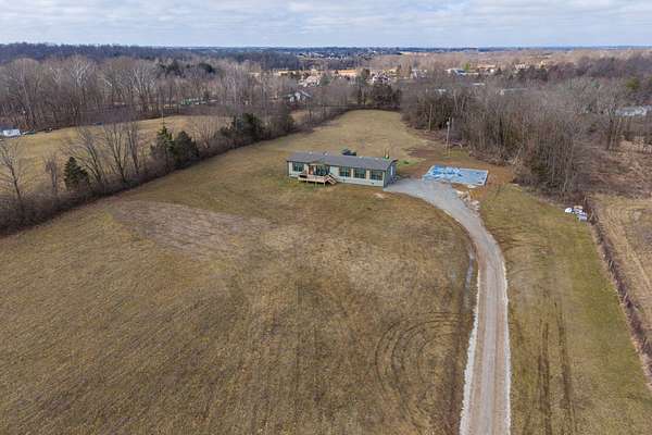 10.1 Acres of Land with Home for Sale in Richmond, Kentucky