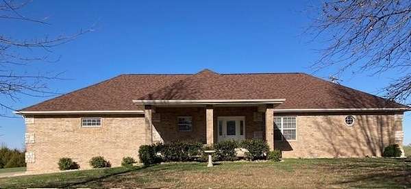 1.76 Acres of Residential Land with Home for Sale in Highlandville, Missouri