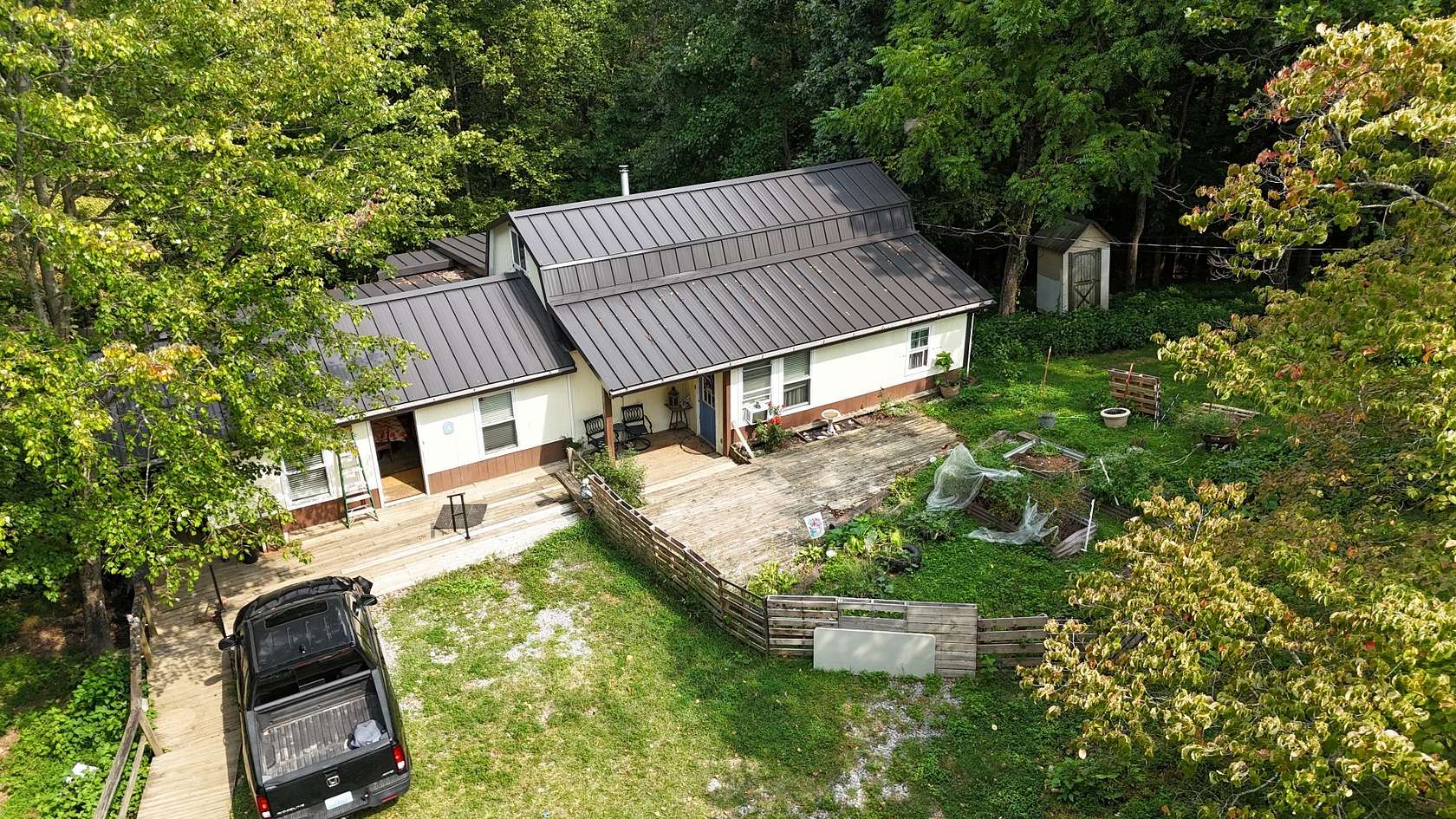 9 Acres of Residential Land with Home for Auction in Woodbury, Tennessee