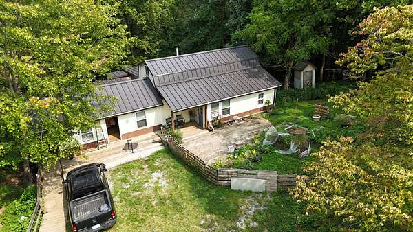 9 Acres of Residential Land with Home for Auction in Woodbury, Tennessee