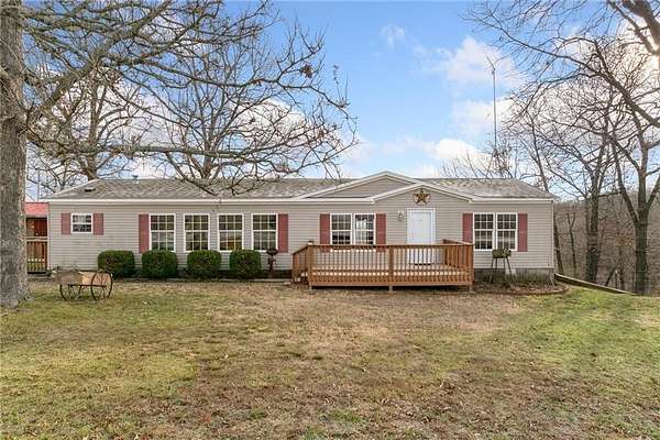 16.7 Acres of Land with Home for Sale in Green Forest, Arkansas