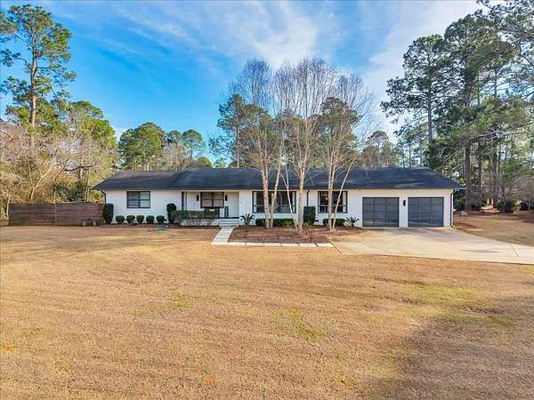 1.5 Acres of Land with Home for Sale in Americus, Georgia