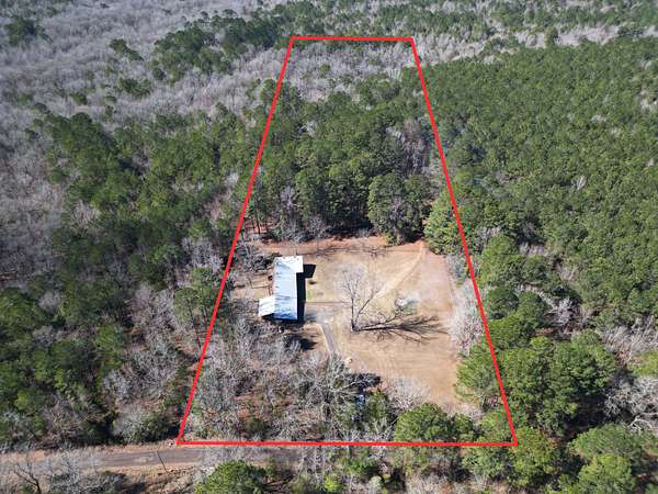 10 Acres of Land with Home for Sale in Atlanta, Texas