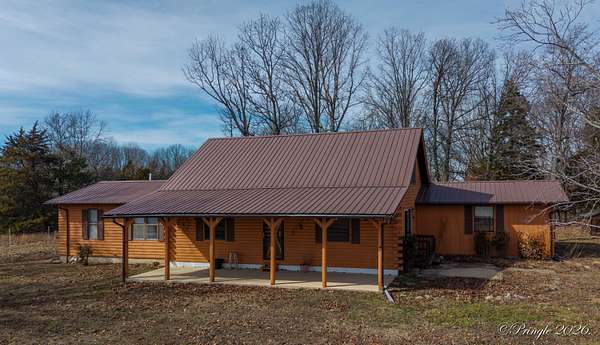 25.9 Acres of Land with Home for Sale in Caulfield, Missouri