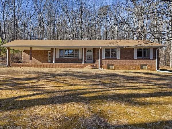 3.14 Acres of Residential Land with Home for Sale in Canton, Georgia