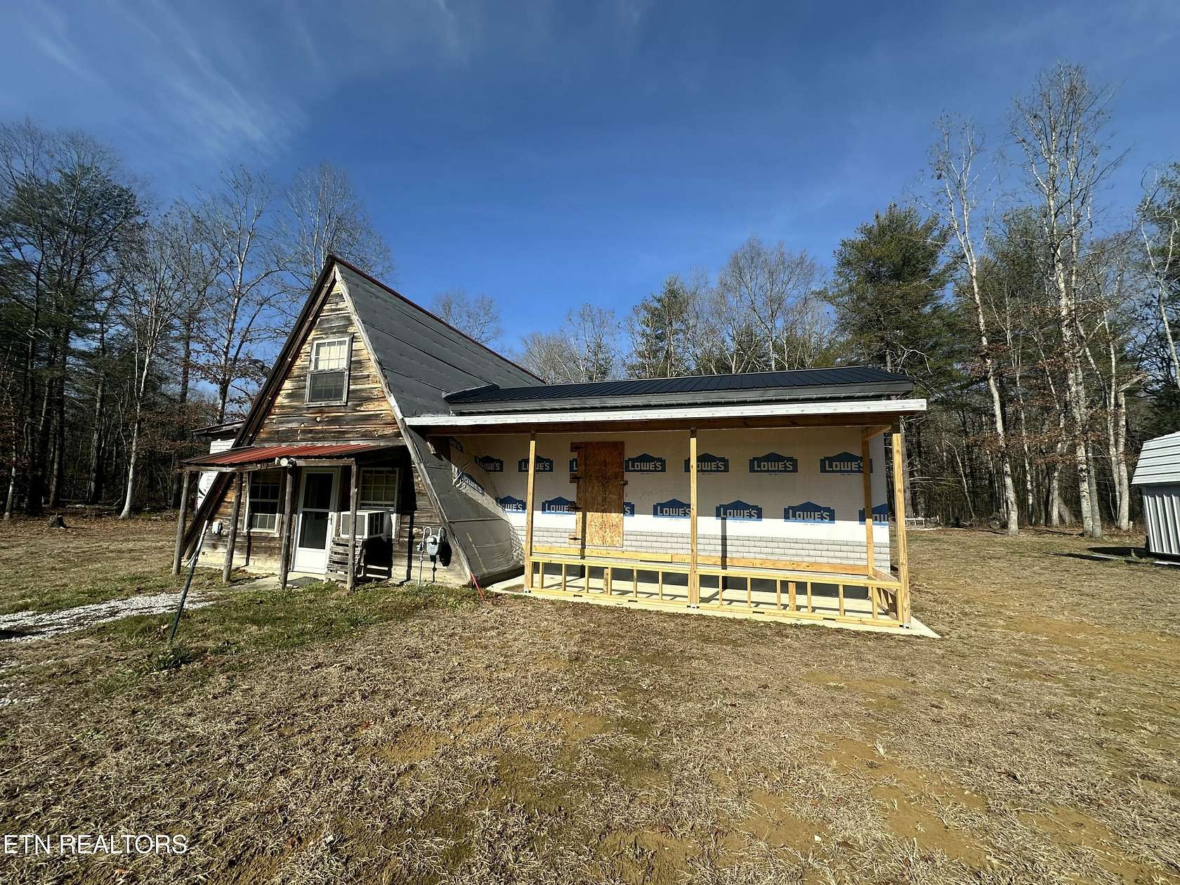 5.16 Acres of Residential Land with Home for Sale in Deer Lodge, Tennessee