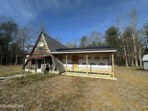 5.16 Acres of Residential Land with Home for Sale in Deer Lodge, Tennessee