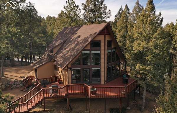 4.35 Acres of Residential Land with Home for Sale in Woodland Park, Colorado