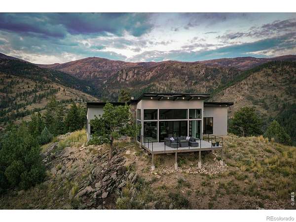 6 Acres of Land with Home for Sale in Glen Haven, Colorado