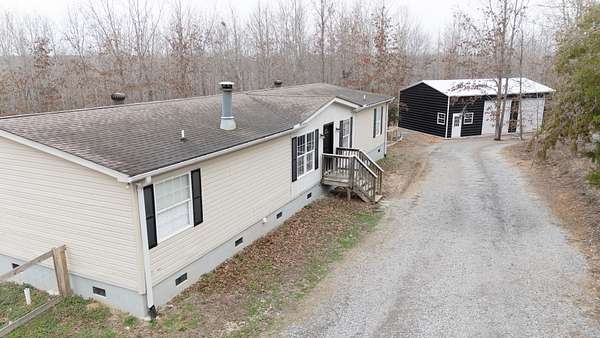 5 Acres of Land with Home for Sale in Centerville, Tennessee