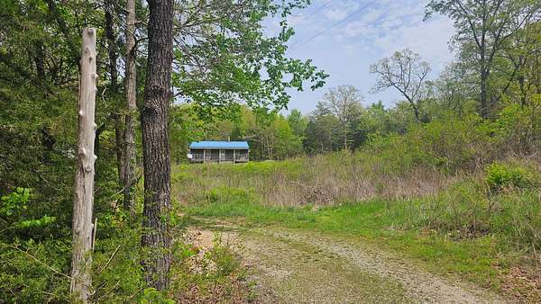 5.7 Acres of Land with Home for Sale in Drury, Missouri
