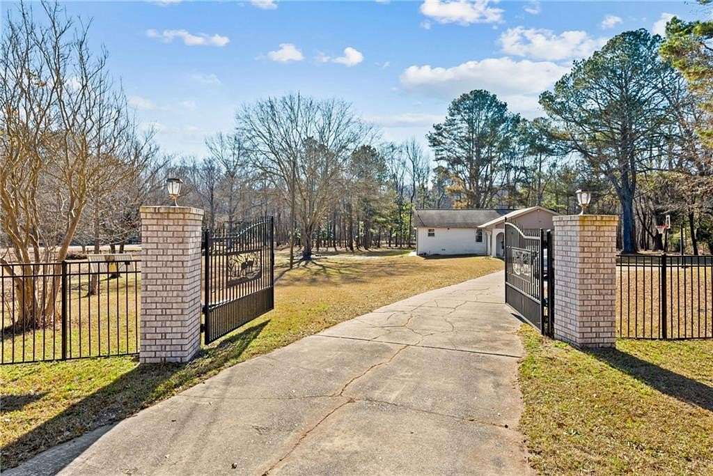 5.75 Acres of Land with Home for Sale in Auburn, Georgia