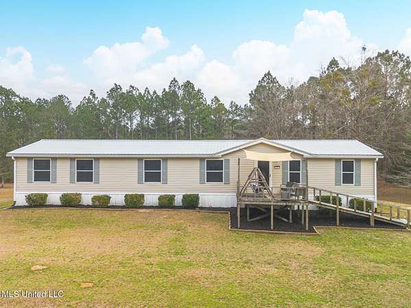 7.3 Acres of Residential Land with Home for Sale in Biloxi, Mississippi