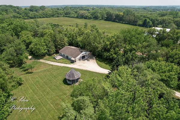 8.56 Acres of Residential Land with Home for Sale in Marengo, Illinois