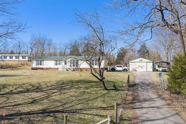 3 Acres of Residential Land with Home for Sale in Jackson, Tennessee