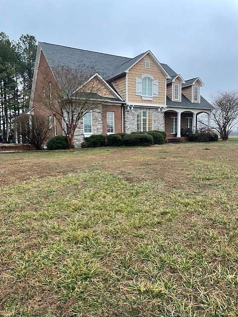 7.6 Acres of Residential Land with Home for Sale in Leoma, Tennessee