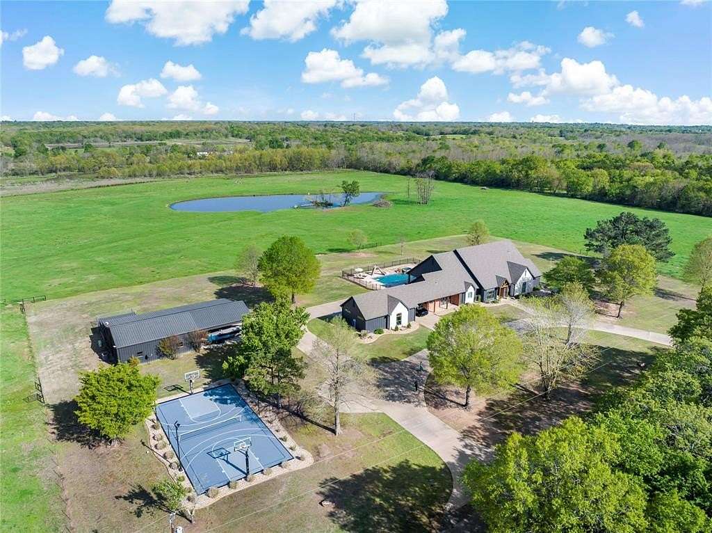 54 Acres of Land with Home for Sale in Paris, Texas