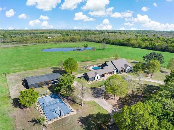 54 Acres of Land with Home for Sale in Paris, Texas