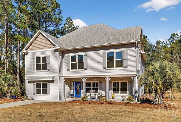 5 Acres of Residential Land with Home for Sale in Richmond Hill, Georgia