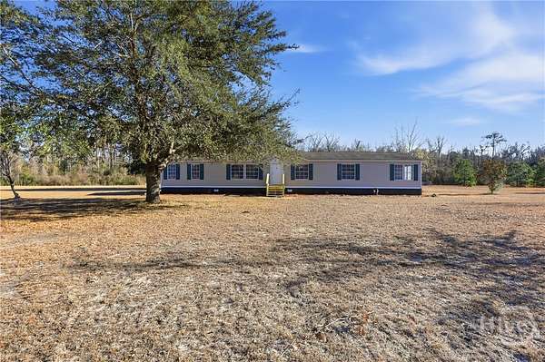 3.5 Acres of Residential Land with Home for Sale in Guyton, Georgia