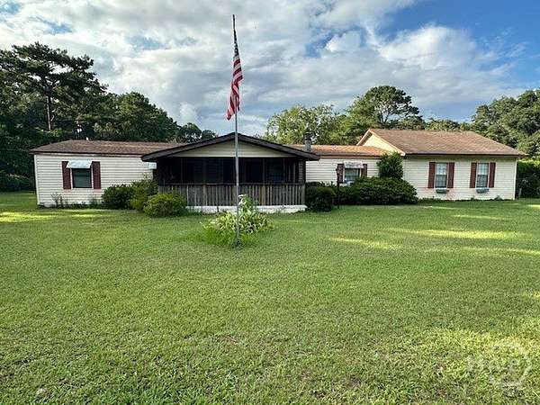 2.22 Acres of Residential Land with Home for Sale in Bloomingdale, Georgia