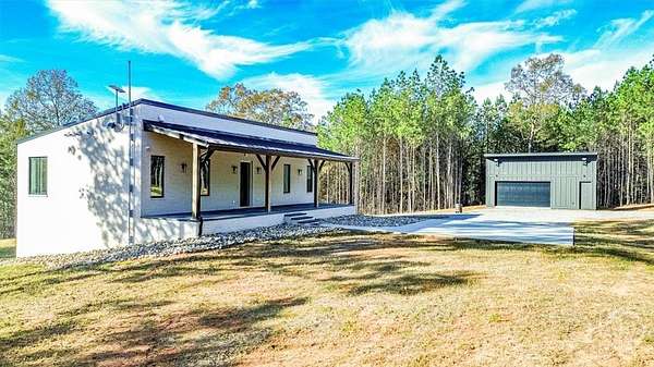 13.9 Acres of Land with Home for Sale in Lexington, Georgia