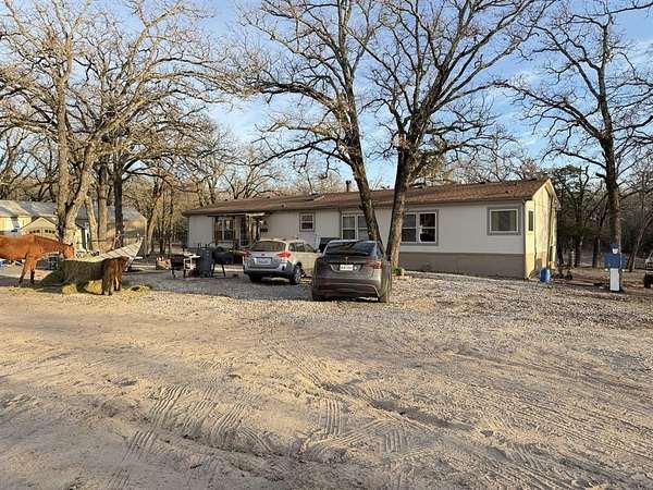 5 Acres of Land with Home for Sale in Quinlan, Texas