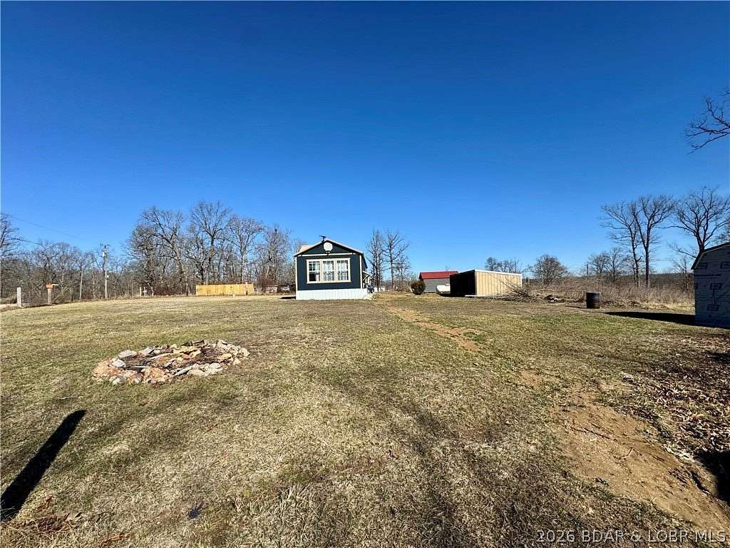 5 Acres of Residential Land with Home for Sale in Versailles, Missouri