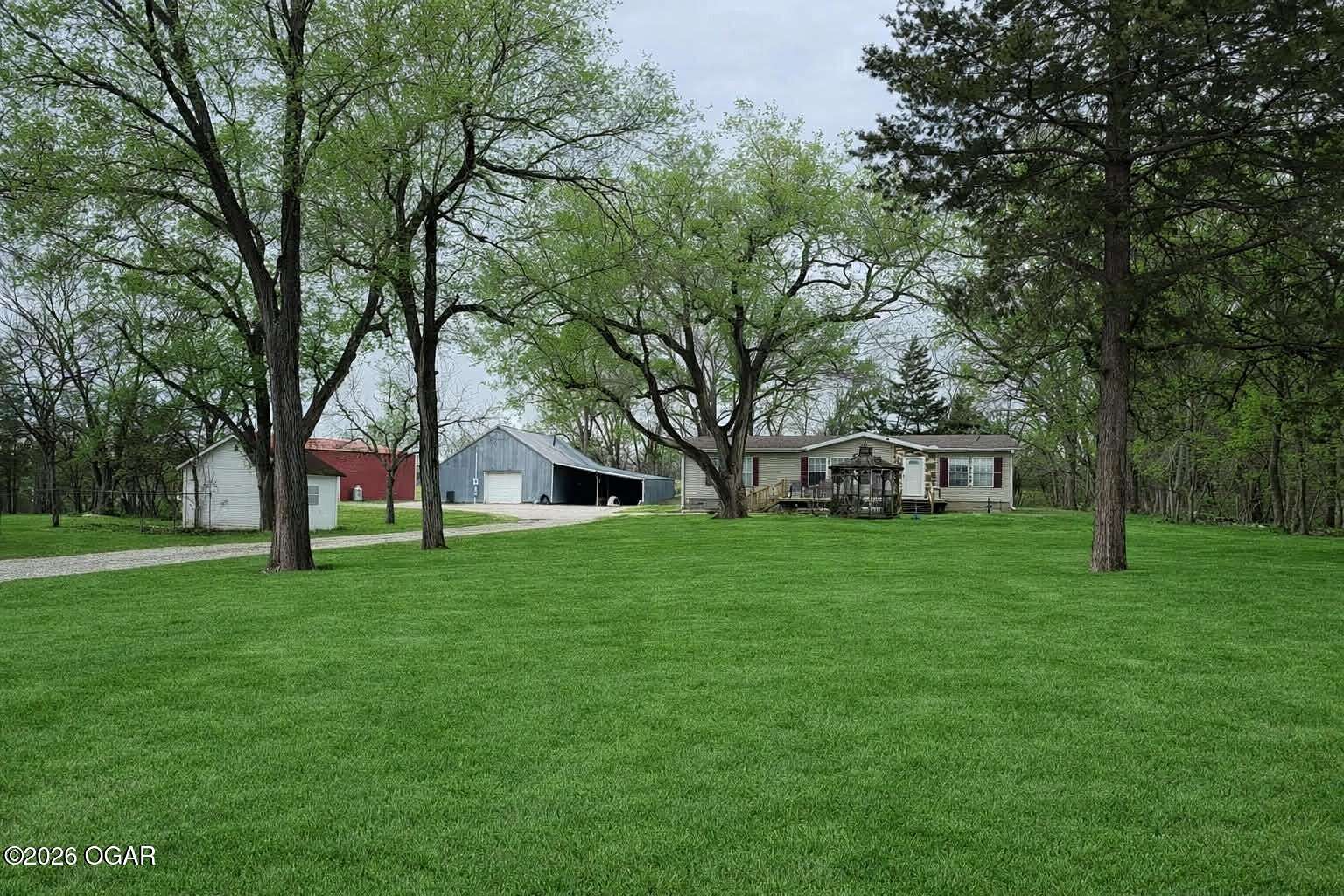9 Acres of Land with Home for Sale in Parsons, Kansas