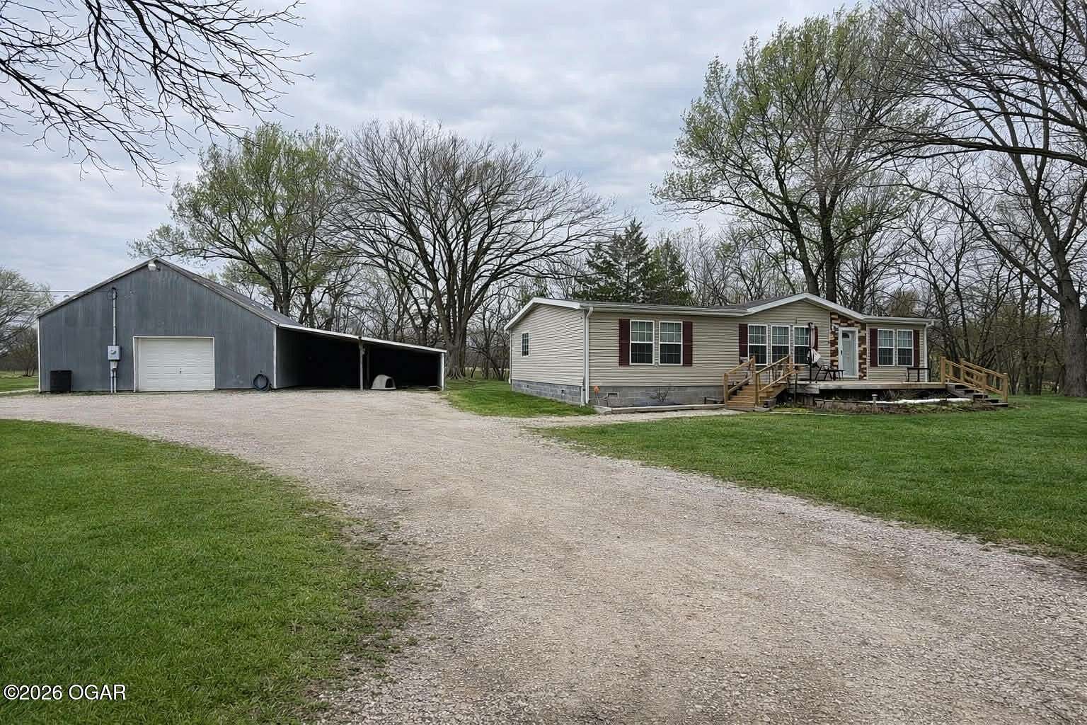 9 Acres of Land with Home for Sale in Parsons, Kansas