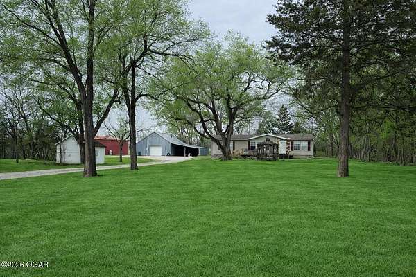 9 Acres of Land with Home for Sale in Parsons, Kansas