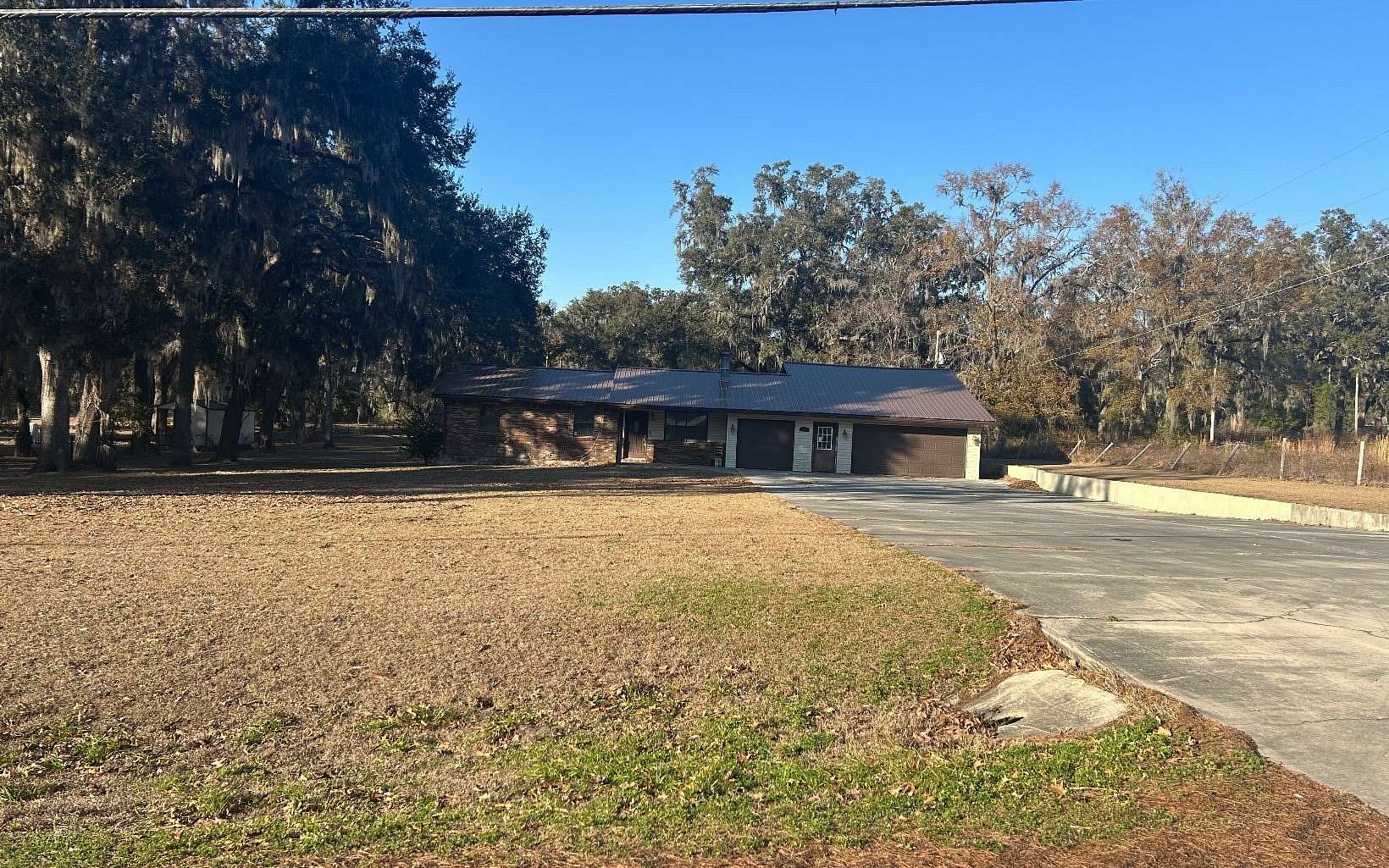 2.27 Acres of Residential Land with Home for Sale in Lake City, Florida