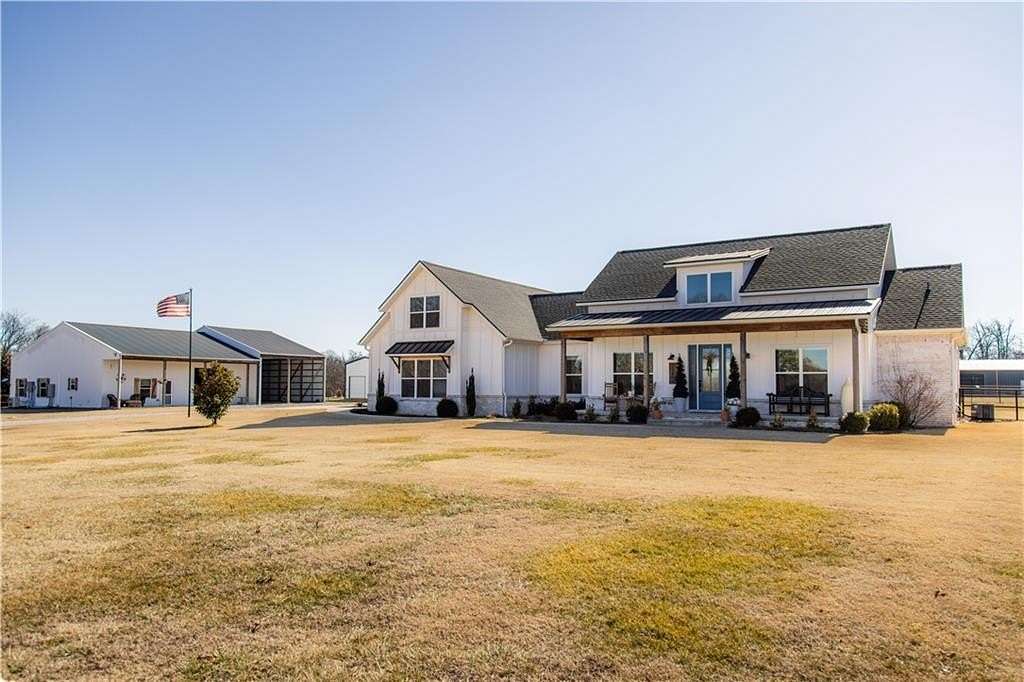 5 Acres of Land with Home for Sale in Gravette, Arkansas