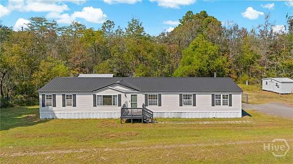 2 Acres of Residential Land with Home for Sale in Ludowici, Georgia