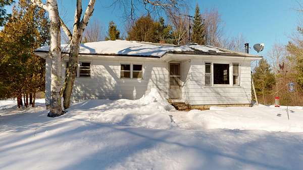 1.9 Acres of Residential Land with Home for Sale in Livermore Falls, Maine