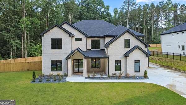 1.83 Acres of Land with Home for Sale in Grayson, Georgia