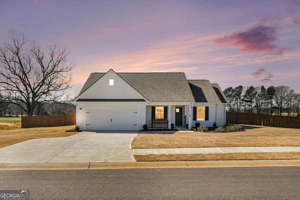 1.5 Acres of Residential Land with Home for Sale in Winterville, Georgia