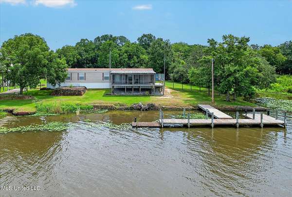 5 Acres of Land with Home for Sale in Pearlington, Mississippi