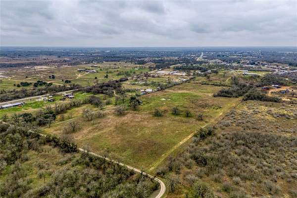 24.2 Acres of Agricultural Land with Home for Sale in Luling, Texas