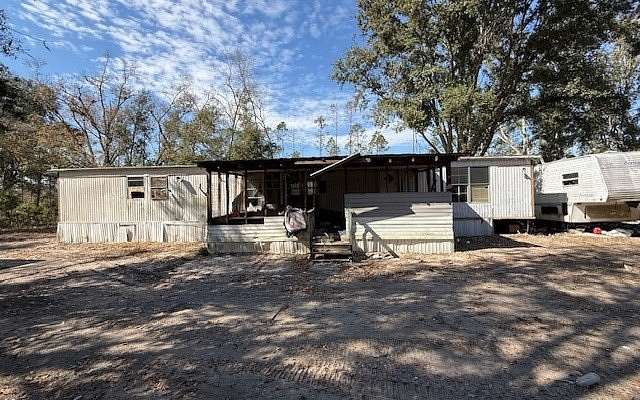 1.76 Acres of Land with Home for Sale in Live Oak, Florida