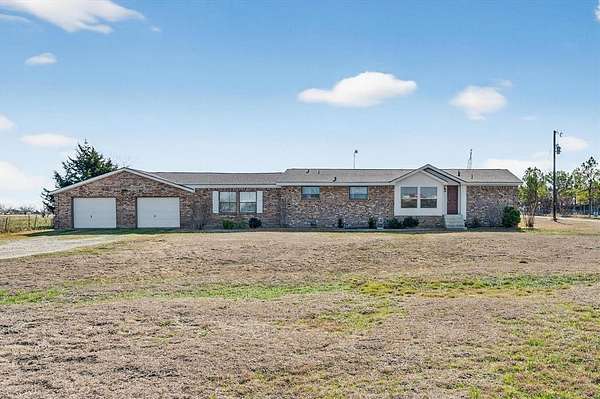 1.57 Acres of Residential Land with Home for Sale in Royse City, Texas