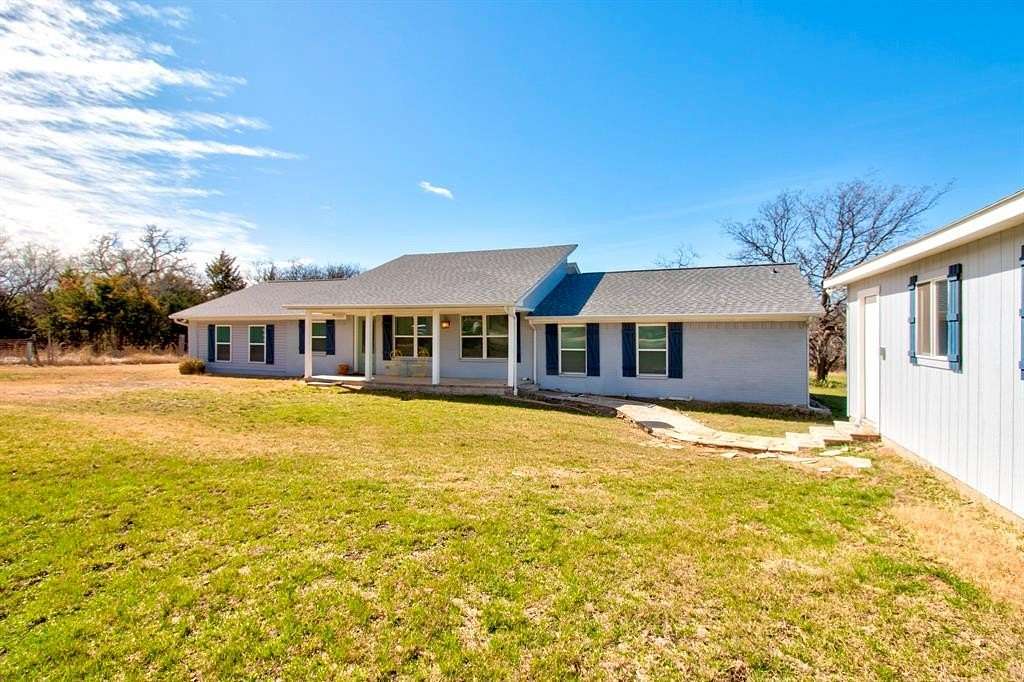 5 Acres of Land with Home for Sale in Cross Roads, Texas