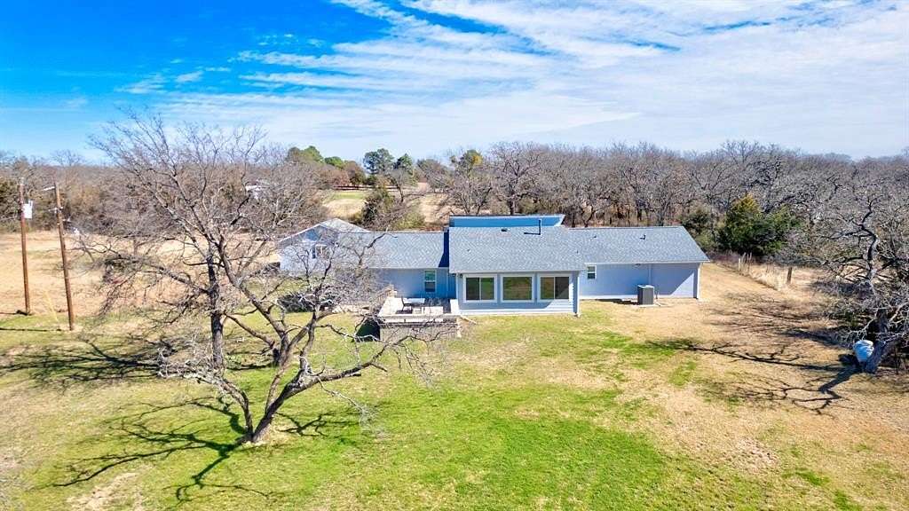5 Acres of Land with Home for Sale in Cross Roads, Texas