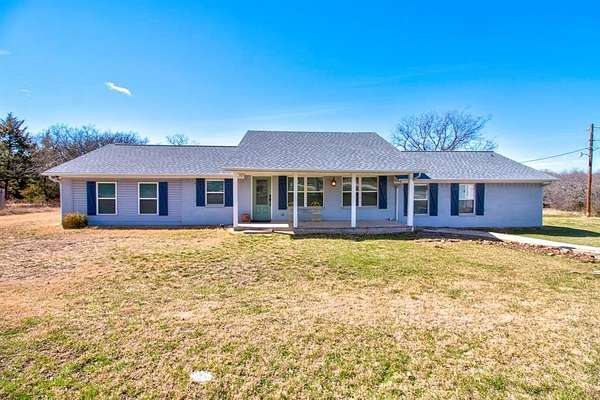 5 Acres of Residential Land with Home for Sale in Cross Roads, Texas