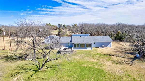 5 Acres of Land with Home for Sale in Cross Roads, Texas